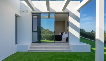 Resa Estates for sale Ibiza Vlla Aixa te koop sale lift sea views exyterior grass.jpg